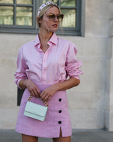 Mini-jupe bicolore rose et noir en tweed